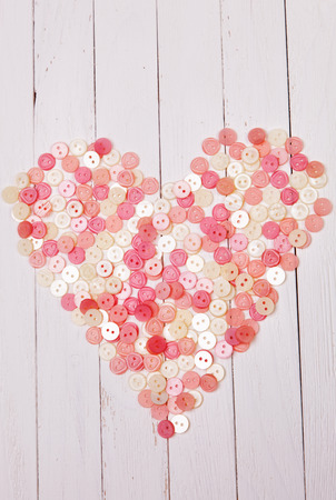 Heart laid out from the buttonsの写真素材