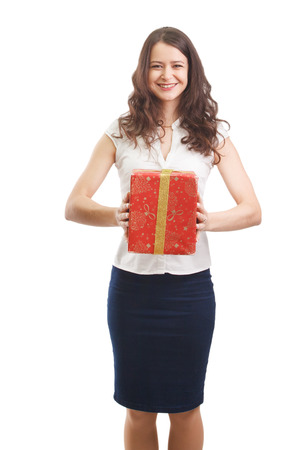 Woman holding a holiday giftの写真素材