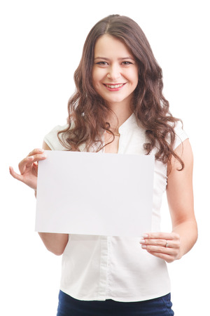 Happy businesswoman holding a white banner and smilingの写真素材