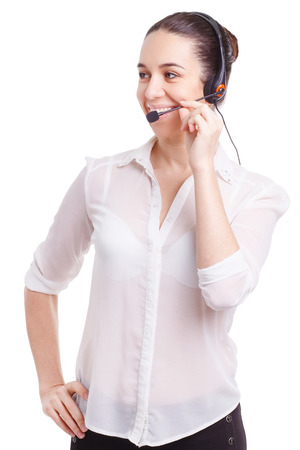 Portrait of happy smiling cheerful young support phone operatorの写真素材