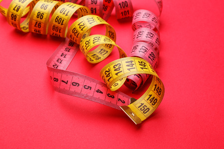 yellow and red measuring tape