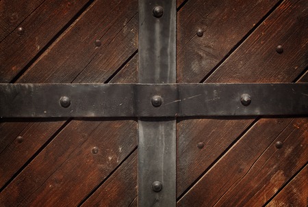 The metal strip on the wooden backgroundの写真素材