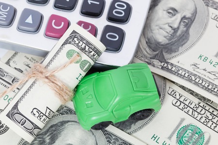 Car money and calculator. Payments and costs.の写真素材