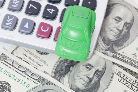 Car money and calculator. Payments and costs.の写真素材