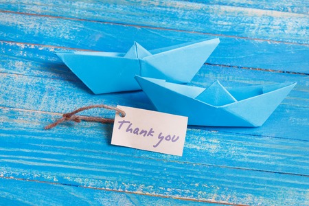 Label with the Words Thank you. Paper Boat with a signの写真素材