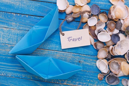 Paper Boat with a sign Travel - travel conceptの写真素材