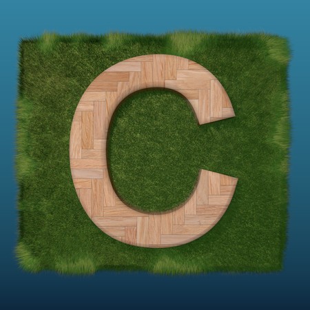 3D decorative wooden Alphabet on green Grass, capital letter Cの写真素材