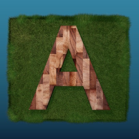 3D decorative wooden Alphabet on green Grass, capital letter Aの写真素材