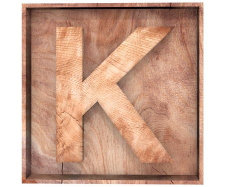 3D decorative wood Alphabet, capital letter K in wooden boxの写真素材