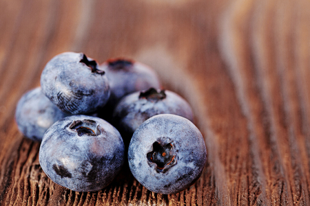 berry blueberries on a wooden backgroundの写真素材