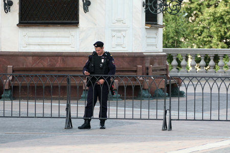 Russian policeman at the entrance of the Cathedral of Christ the Savior in Moscow.のeditorial素材