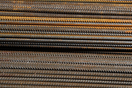 Steel rods in the construction site, close-up. Abstract background