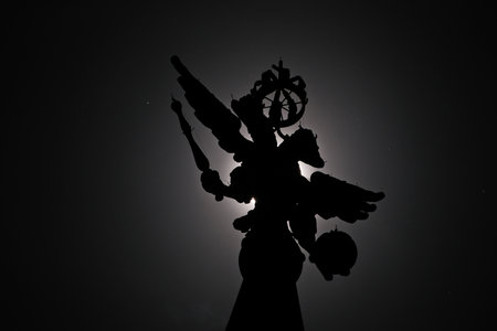 The silhouette of the Russian imperial double-headed eagle on Red Square in Moscow, dramatically set...