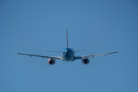Airplane in the blue sky.の写真素材
