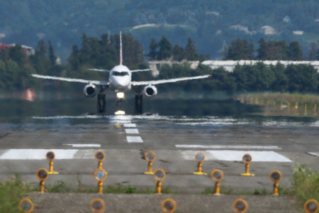 Airplane taking off from airport runway. Airplane taking off from runway.
