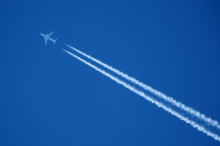 airplane in the blue sky, closeup of photo with soft focus