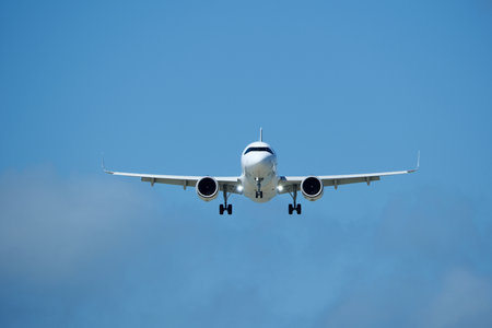Airplane in the blue sky.