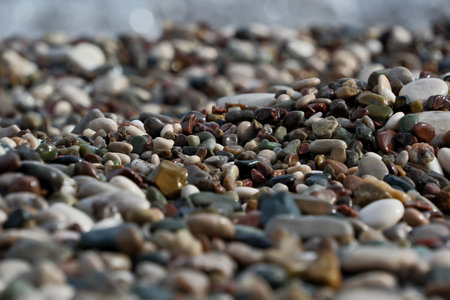 Colorful pebble stones on the beach, close-up