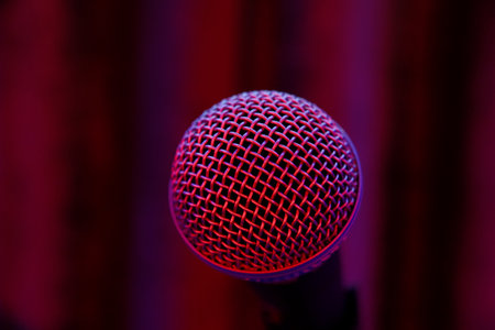 Microphone on stage in a concert hall or conference room, close-upの写真素材
