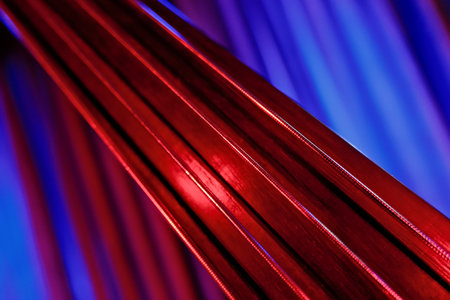 Close-Up of Strings with Red and Blue Dramatic Lightingの写真素材