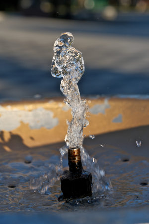 Water fountain with jets of water. Shallow depth of field