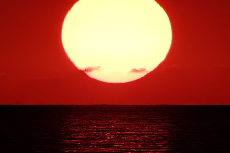 Sunset on the sea in the tropics. Red color.