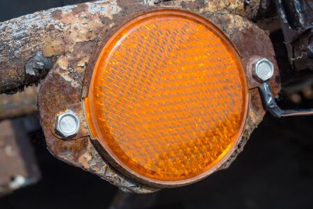 orange light reflector on car trailer