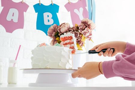 Sliced cake with pink filling in the shower partyの写真素材