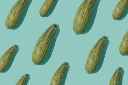 Pattern with squash. Vegetables abstract background. Squash on turquoise blue background.の写真素材