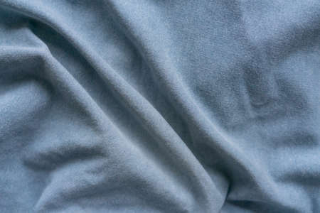 Blue color fabric texture background, close up. Top view, copy space.の写真素材
