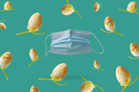 New normal seasons, spring with flying protective mask. One year of coronovirus pandemic crisis....