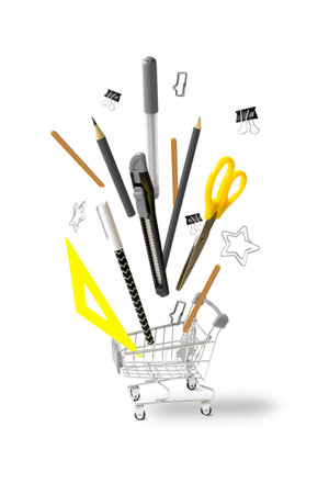 Trolley with flying gray yellow school equipment on white background isolated. Zero gravity concept, back to school.の写真素材