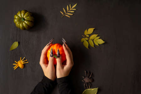 Halloween Nail Art Design, hands and decorations.の写真素材