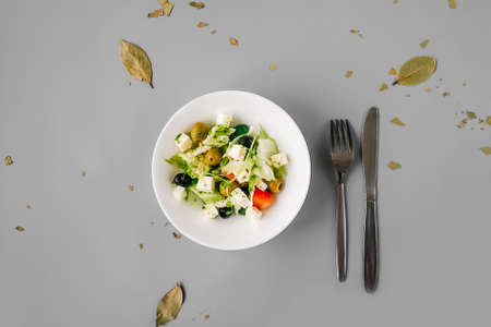 Greek salad on gray background. Top view.の写真素材