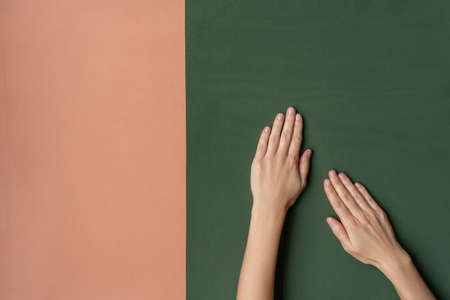 Beautiful female hands with natural manicure. Copy spaceの写真素材