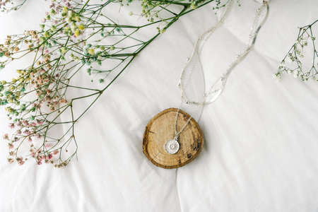 Silver bijouterie chain on white background.の写真素材
