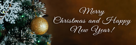 Christmas tree with golden ball, brown background.の写真素材