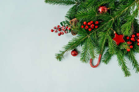Christmas flat lay with fir and baubles.の写真素材