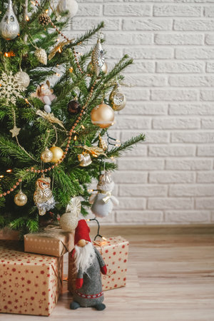Beautiful decorated Christmas tree on white wall background.の写真素材