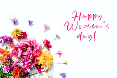 Flowers composition on white background with text.の写真素材