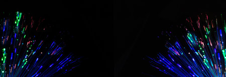 Blurred blue green splash, bokeh light effect background. Black background with Copy space.の写真素材
