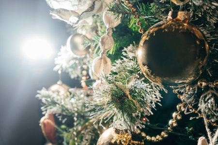 Decorated Christmas tree with balls, beads and baubles. Close-up.の写真素材