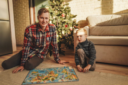 Happy family playing board game walkerの写真素材