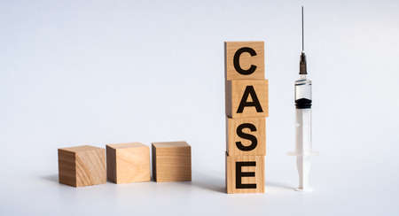 CASE word on wooden cubes on a white background. Trial content.の写真素材