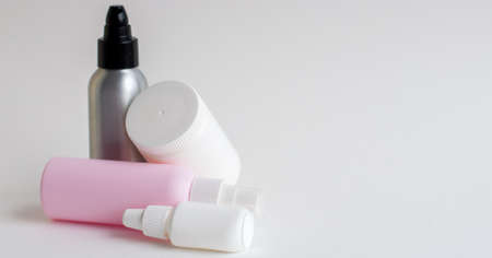 Pills, tablets and bottle on turquoise background. Copy spaceの写真素材