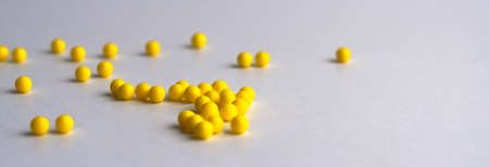 Tablets in blister and gray bottle antiseptikum lies on the steel. Place for the label.Medical topic.の写真素材