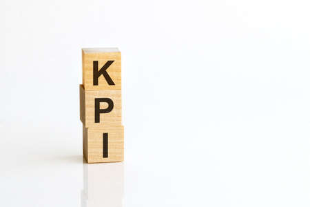 KPI - words from wooden blocks, front view. KPI - Key Performance Indicatorsの写真素材