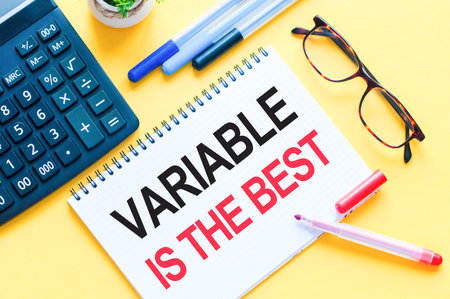 Writing text showing VARIABLE IS THE BEST. Word text VARIABLE IS THE BEST on white paper card, red and black letters. Business and education concept.の写真素材