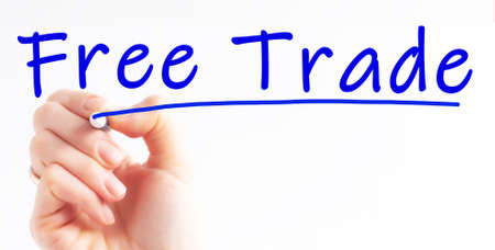 hand writing inscription free trade with blue color marker, concept, stock imageの写真素材