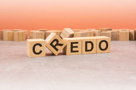 word Credo made with wood blocks. text is written in black letters, light background, business concept.の写真素材